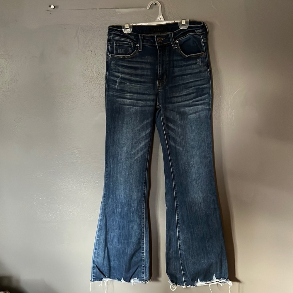 Risen. Flare raw hem. Size 29  slight distressed